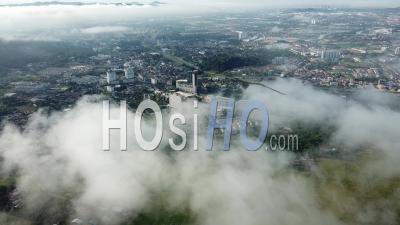 Aerial View Descending The Cloud With Background Bukit Mertajam Town - Video Drone Footage