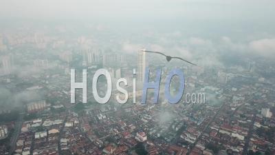 Aerial Panning George Town Is Covered With Fog Cloud In Morning. - Video Drone Footage