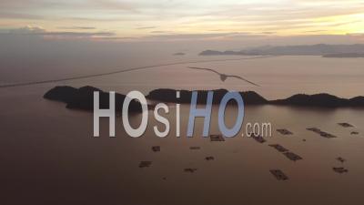Aerial View Sunset Of Penang Second Bridge, Pulau Aman Island - Video Drone Footage