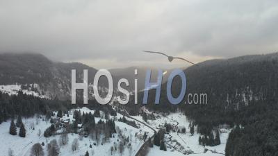 Wooden Chalet In The Snow - Vosges - Video Drone Footage