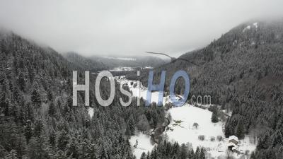 Wooden Chalet In The Snow - Vosges - Video Drone Footage