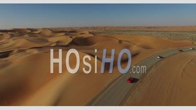 Cars On A Desert Road - Video Drone Footage