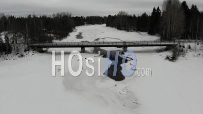 Narrow Bridge Over A Wide River - Video Drone Footage