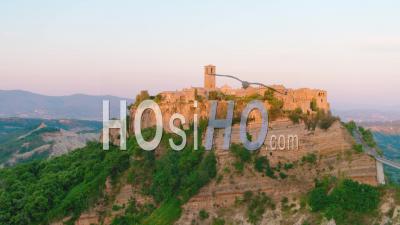 Summer View Of Civita Di Bagnoregio On Top Of The Rock, Illuminated By The Evening Sun. 