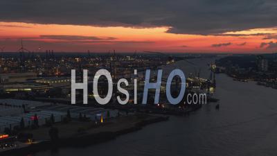 Frantic Sunset In Hamburg, Establishing Aerial View Shot Of Hamburg De, Mecklenburg-Western Pomerania, Germany - Video Drone Footage