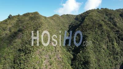 Reunion Island, Massif Du Dimitile, Cirque De Cilaos And Piton Des Neiges In The Distance, France - Video Drone Footage