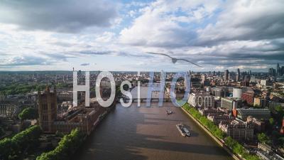 Establishing Aerial View Shot Of London Uk, United Kingdom, Palace Of Westminster, Parliament, Big Ben, London Eye, West Entrance To The City - Video Drone Footage