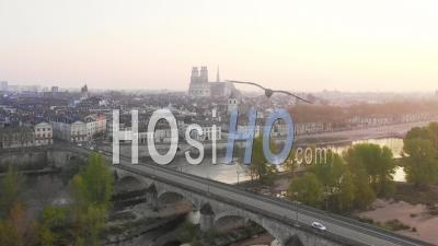 Orleans, City And George V Bridge Over The Loire At Sunrise, Loiret, France - Drone Point Of View