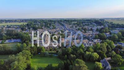 Aerial Drone View Of Cotswolds Village And Burford Church In England, A Popular English Picturesque Tourist Destination In The Countryside Of Gloucestershire