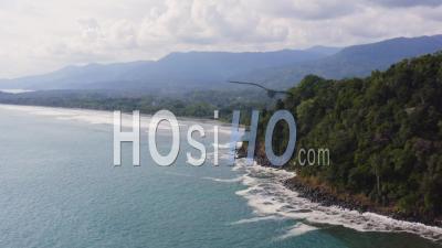 Aerial Drone View Of Rainforest And Ocean On The Pacific Coast In Costa Rica, Tropical Jungle Coastal Landscape Scenery With The Sea And Coastline At Ballena Marine National Park