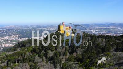 Aerial Drone View Of Pena Palace, Sintra, Lisbon, Portugal, A Beautiful Colourful European Building With Amazing Architecture, Popular Tourist Attraction Unesco World Heritage Site, Europe