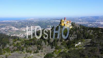Aerial Drone View Of Pena Palace, Sintra, Lisbon, Portugal, A Beautiful Colourful European Building With Amazing Architecture, Popular Tourist Attraction Unesco World Heritage Site, Europe