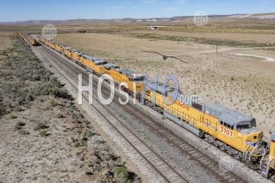 Locomotives Parked In Desert - Aerial Photography