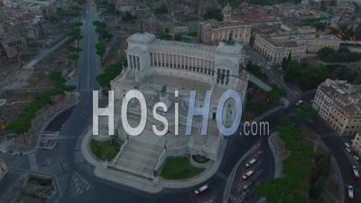 Aerial Slide And Pan Footage Of Majestic Vittoriano Monument At Dusk. Large Historic Landmark From White Marble. Rome, Italy - Video Drone Footage
