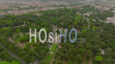 High Angle View Of Green Trees And Vegetation In City Park. Place For Walk And Relax In Nature In Town. Rome, Italy - Video Drone Footage