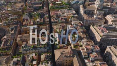 High Angle View Of Rooftop Terraces With Green Plants. Tilt Up Revealing Panoramic View Of Historic Urban Borough With Famous Landmarks. Rome, Italy - Video Drone Footage