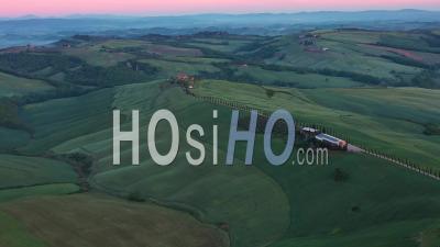 Italy, Tuscany, Val D'orcia, Siena Province, Cypress Tree Road Near Asciano - Video Drone Footage