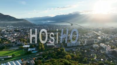 Aerial View Of A Sunrise Over The Capital Of The Alps Grenoble - Video Drone Footage