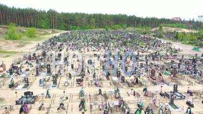 2022 - Shocking Aerial Of Vast Acres Of Fresh Graves In The Cemetery In Irpin (kyiv) Ukraine Following Russian Aggression - Video Drone Footage
