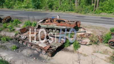2022 - Aerial Over Destroyed And Abandoned Russian Tanks And War Equipment Left Along A Road During Ukraine's Summer Offensive - Video Drone Footage