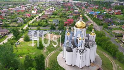 2022 - Church Of St. Andrew Pervozvannoho All Saints In Bucha, Ukraine Where Dozens Of Unmarked Graves Were Unearthed - Video Drone Footage