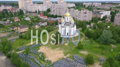 2022 - Church Of St. Andrew Pervozvannoho All Saints In Bucha, Ukraine Where Dozens Of Unmarked Graves Were Unearthed - Video Drone Footage