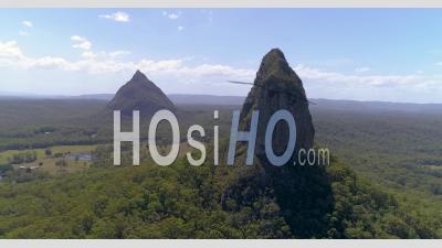 An Aerial View Shows The Glass House Mountains In Queensland, Australia - Video Drone Footage