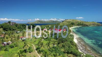 An Aerial View Shows Dwellings On Yanuya Island, Fiji - Video Drone Footage
