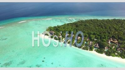 An Aerial View Shows An Island Resort On Maldives - Video Drone Footage