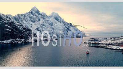 Boats And Buildings Are Seen In The Wintry Lofoten Islands, Norway - Video Drone Footage