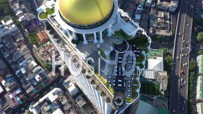 A Bird's-Eye-View Shows The Sky Bar Atop The State Tower In Bangkok, Thailand - Video Drone Footage