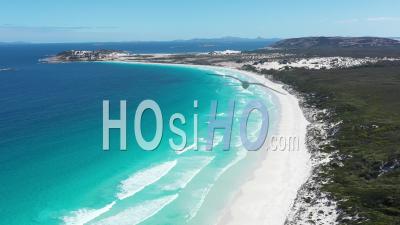 2020 - Cars Driving On The White Sands Of Wharton Bay As Clear Blue Water Laps The Shore In Esperance, Australia - Video Drone Footage