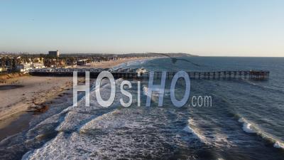 Aerial Over Surfers At Crystal Pier, San Diego, California - Video Drone Footage
