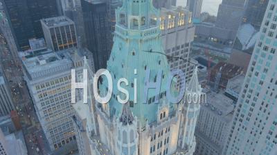 2022 - Beautiful Aerial Top Down View Of The Woolworth Building Skyscraper In Manhattan, New York City - Video Drone Footage