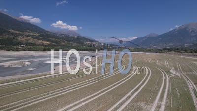 The Tail Of Serre Ponçon Lake In Summer, During A Drought, Hautes-Alpes, France, Viewed From Drone