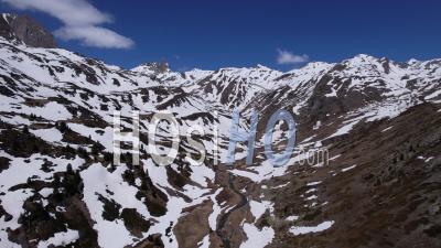 Upper Clarée Valley In Spring When The Snow Has Started To Melt, Hautes-Alpes, France, Viewed From Drone