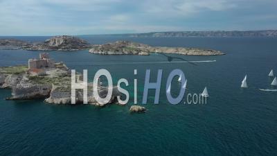 Sailboat Regatta In Marseille Bay, Between The Frioul Islands, The If Castle And The City Of Marseille, Bouches-Du-Rhone, France - Video Drone Footage