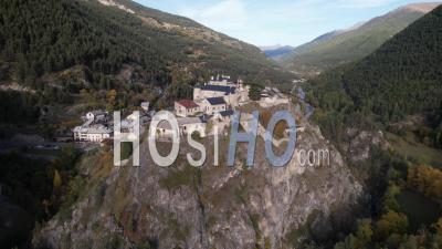 Stronghold Of Château Queyras, On Its Rock, In Autumn, Hautes-Alpes, France, Viewed From Drone