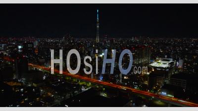 Aerial At Night With Tokyo Skytree Visible - Video Drone Footage