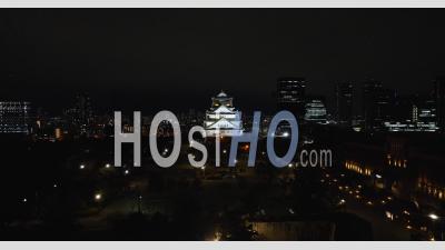 Osaka Castle At Night From A Distance - Video Drone Footage