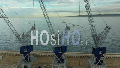 Marseille, Euromediterranean Area, Seawall, Former Cranes Of The Large Maritime Port Of Marseille, Bouches-Du-Rhone, France - Video Drone Footage