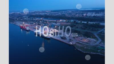Seaport And Cargo Ships At Night, Caronte Channel, Martigues, Bouches-Du-Rhone, France - Aerial Photography