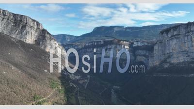 Vercors Regional Natural Park From The Caverns Of Choranche, Panorama On The Presles Cliffs, Drome, France - Video Drone Footage