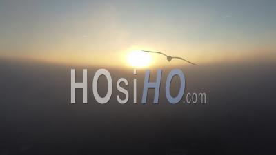 Aerial View Of Sunrise Above The Clouds In Winter In Moissac, France - Video Drone Footage