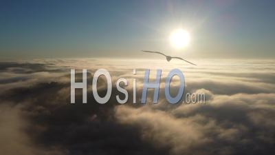 Aerial View Of Sunrise Above The Clouds In Winter In Moissac, France - Video Drone Footage