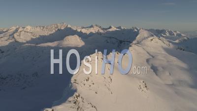 Aerial Footage Of Snow Covered Mountains In The Austrian Alps - Video Drone Footage