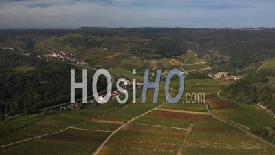 Saint Aubin Vineyard And Town With Automn Leaves In Burgundy, France - Video Drone Footage