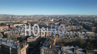 Tenement Housing In Glasgow’s Southside Near Victoria Road With The City Centre And The Campsies Mountains In The Background - Video Drone Footage