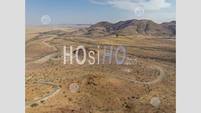 Aerial View Of The Desert Road D1275 At Spreetshoogte Pass, Namibia - Aerial Photography
