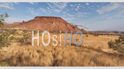 Red Granite Rocks And Hills Nearby Twyfelfontein, Namibia - Video Drone Footage
